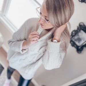 Cream turtleneck cable pullover